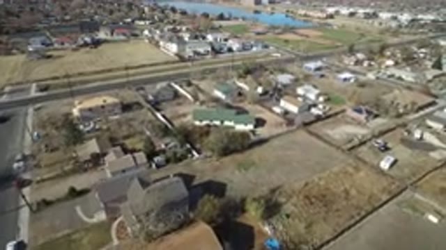WESTMINSTER COLORADO-2016: Houses Trees Fields And Lard Near An Artificial Lake