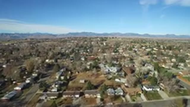 WESTMINSTER COLORADO-2016: Serene Drone Flight Over Town With Houses And Trees