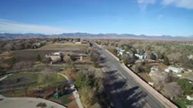 WESTMINSTER COLORADO-2016: Drone Flying Over Suburban Roads, Traffic, Trees and Cars
