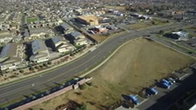 WESTMINSTER COLORADO-2016: A Top View Of A Major Road With Houses Trees Cars And