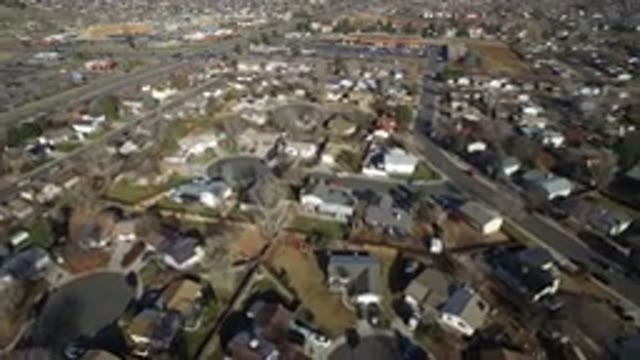 WESTMINSTER COLORADO-2016: Drone Shot Of Houses And Backyards Road Running