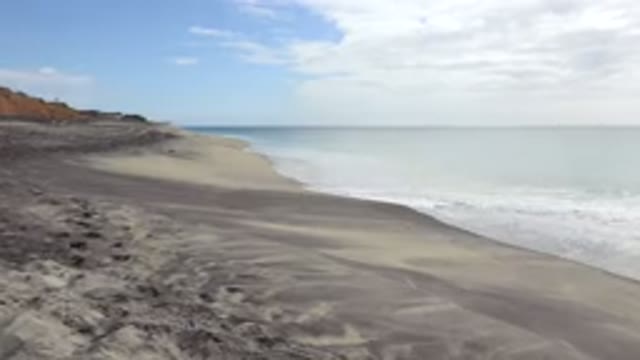 SAN JOSE DEL CABO MEXICO-2017: Empty Sandy Beach Dunes To The Left Sea To The Right