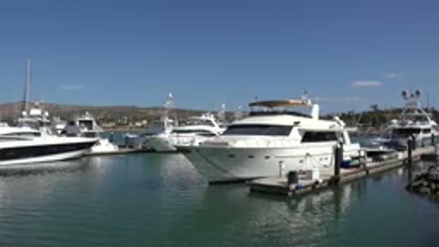 SAN JOSE DEL CABO MEXICO-2017: A Pier With Beautiful Yachts And A Blue Sky With Clouds