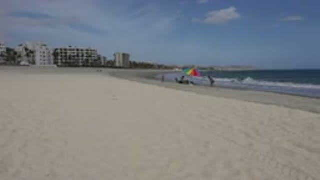SAN JOSE DEL CABO MEXICO-2017: Playing With Kid At Beach