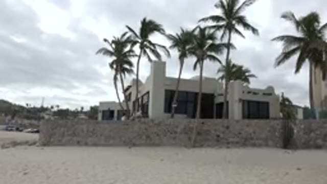 SAN JOSE DEL CABO MEXICO-2017: Sand House Building Palm Tree Stone Gates On