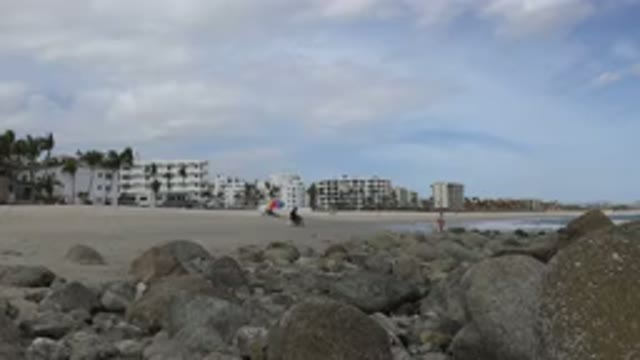 SAN JOSE DEL CABO MEXICO-2017: People Stand By A Beach Looking At The Sea While