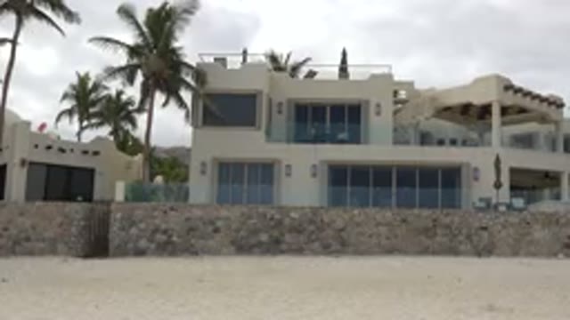 SAN JOSE DEL CABO MEXICO-2017: The Wind Hits The Trees And The House Set On The