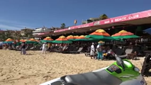 CABO SAN LUCAS MEXICO-2017: A Seashore With Lots of People and Blue Water Sea