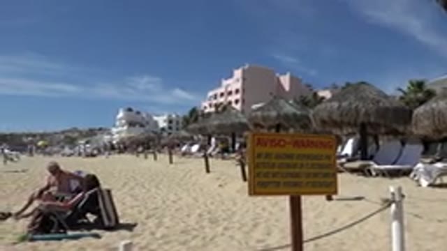 CABO SAN LUCAS MEXICO-2017: Summer Leisure Time Spent On A Busy Sandy Beach With