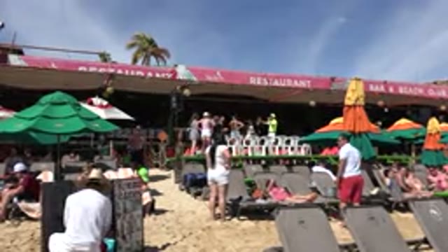 CABO SAN LUCAS MEXICO-2017: People Relaxing Lying On Chairs In A Tent On The Beach
