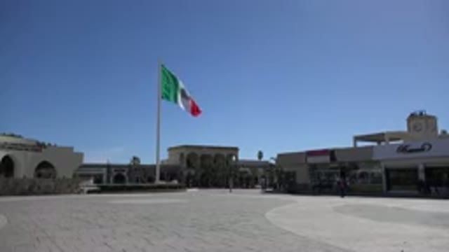 LOS CABOS MEXICO-2017: People Walking In A Square In The Shopping Center With A