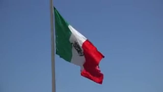 LOS CABOS MEXICO-2017: The Flag Of Mexico Flapping In The Wind