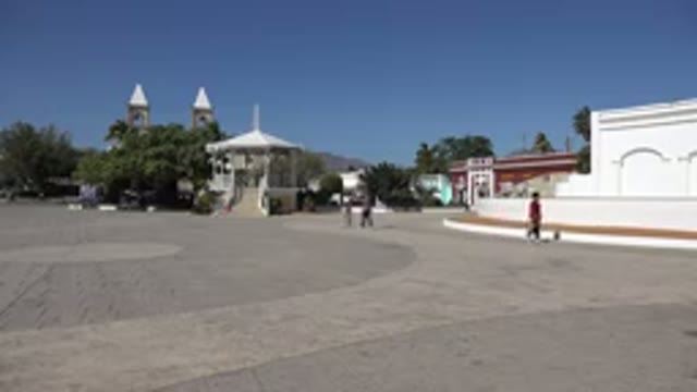 LOS CABOS MEXICO-2017: Few Latin Kids Running And Playing Around An Empty Square