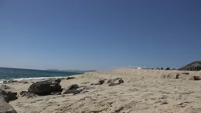 LOS CABOS MEXICO-2017: Beautiful Day Seeing The Waves In The Sand Between Rocks