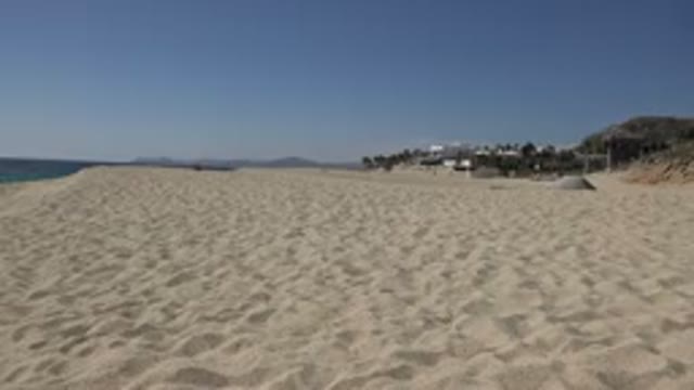 LOS CABOS MEXICO-2017: Empty Beach With Clean Clear Sand On A Sunny Day The Sea