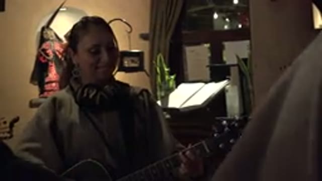 LOS CABOS MEXICO-2017: Lady Plays Guitar And Sings For A Group Of People