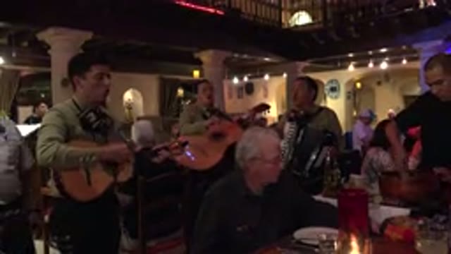 LOS CABOS MEXICO-2017: Bar Filled With Singing People and Others Playing Guitars