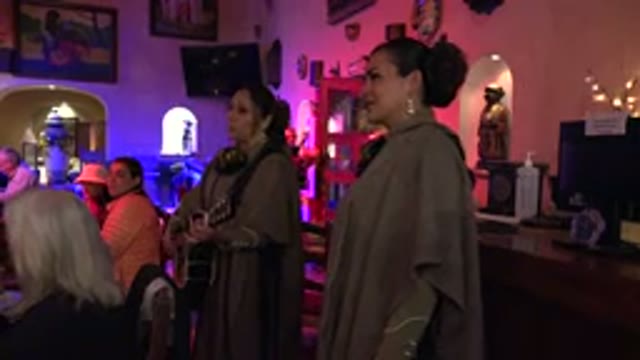 LOS CABOS MEXICO-2017: Two Women Perform In A Club One Of Which Plays An Instrument
