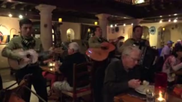 LOS CABOS MEXICO-2017: People Gather In A Restaurant With Music And Food