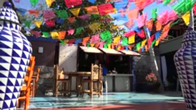 LOS CABOS MEXICO-2017: Colorful Flags Flutter In Summer Breeze Of A Marketplace