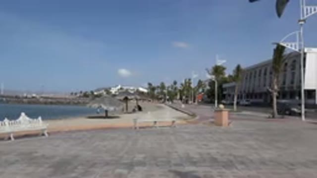 LOS CABOS MEXICO-2017: A Sunny Day Along The Promenade With People Out Doing