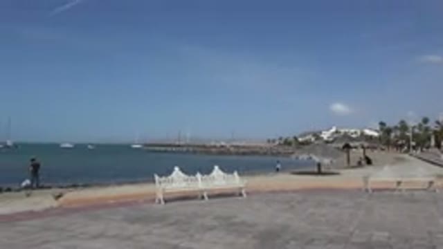 LOS CABOS MEXICO-2017: People Walk Near A Promenade