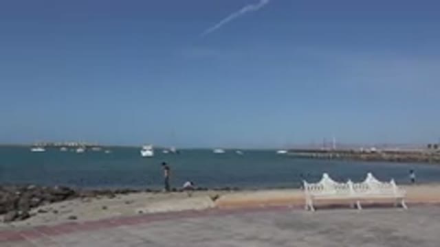 LOS CABOS MEXICO-2017: A Father Enjoying The Seaside With His Two Children