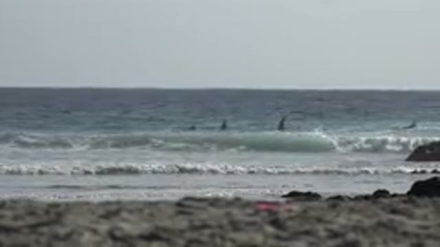 LOS CABOS MEXICO-2017: A View From The Beach With Waves Rolling Onto Shore