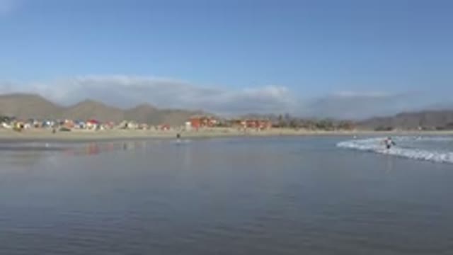LOS CABOS MEXICO-2017: Wide View Of A Beach With Shallow Water And People