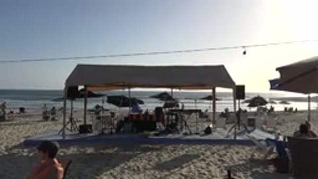LOS CABOS MEXICO-2017: The Beach With People Relaxing And Immersing In The