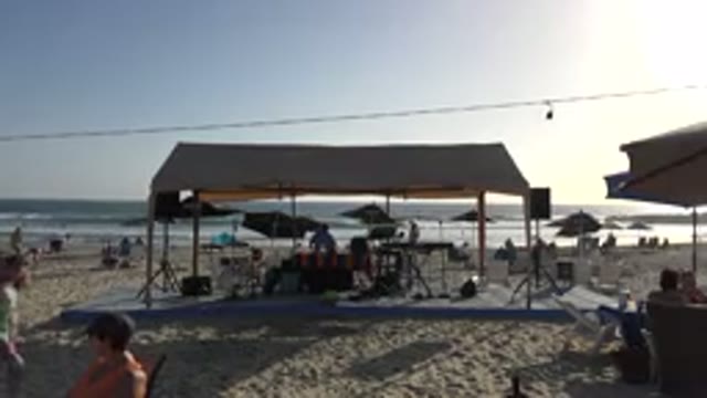 LOS CABOS MEXICO-2017: A Sunny Day At The Beach With Several Beach Goers Who Are