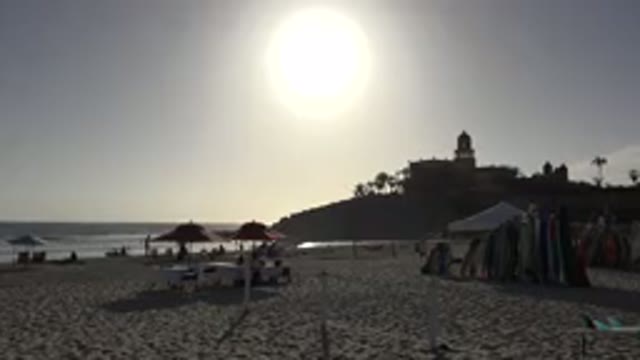 LOS CABOS MEXICO-2017: Seashore With Multiple Tents And Beachgoers With Sun