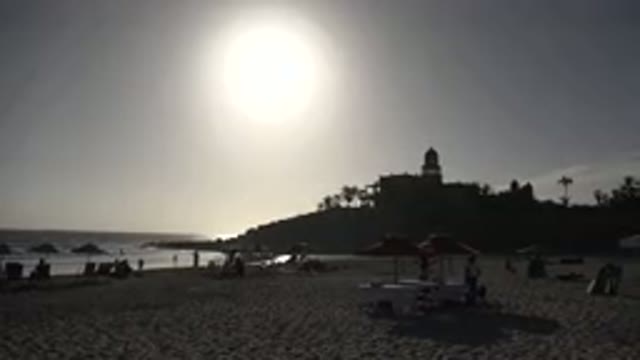 LOS CABOS MEXICO-2017: Sunsets By The Sea While Bathers Watch The Beautiful