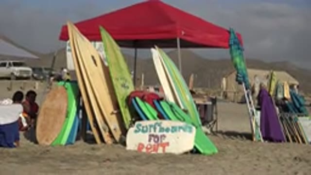 LOS CABOS MEXICO-2017: A Red Tent on the Sand Sells Surfboards