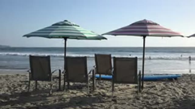 LOS CABOS MEXICO-2017: Beach Chairs Sitting On The Sandy Beach Overlook The Ocean