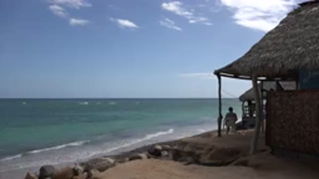 CABO PULMO MEXICO-2017: A View Of A Beach Front And There Is A Beach House And