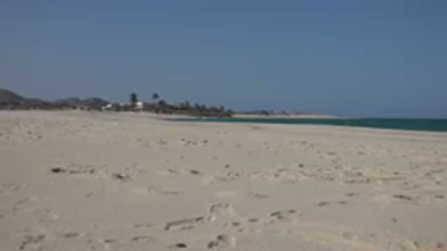 CABO PULMO MEXICO-2017: Teaks Of Feet On The Sand By The Beach With Sea On The