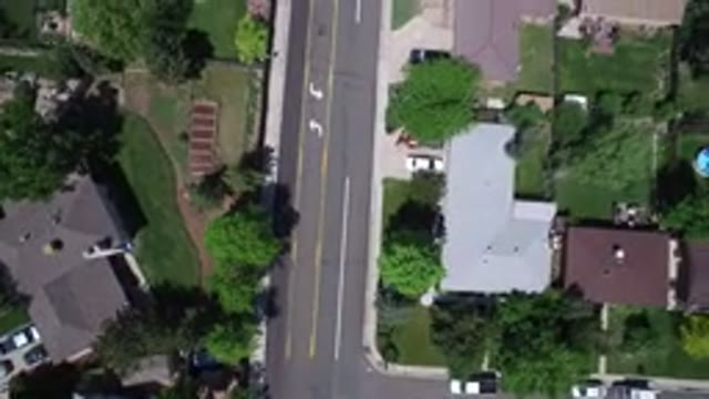 WESTMINSTER COLORADO-2017: A Street With Beautiful Houses With Trees Cars And
