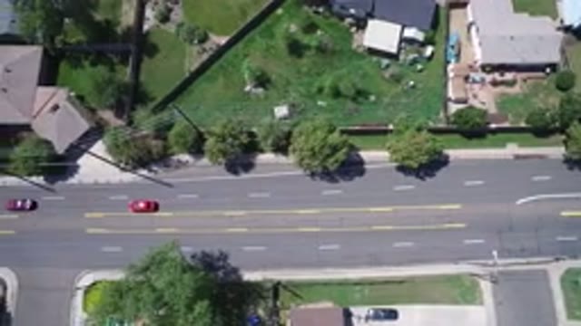 WESTMINSTER COLORADO-2017: Overhead View Of A Drone On A Large Avenue In A Quiet Neighborhood