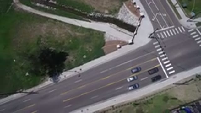 WESTMINSTER COLORADO-2017: Cars Moving on a Tree-Lined Road