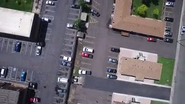 WESTMINSTER COLORADO-2017: An Aerial View Of Cars Houses And Parking Lots With
