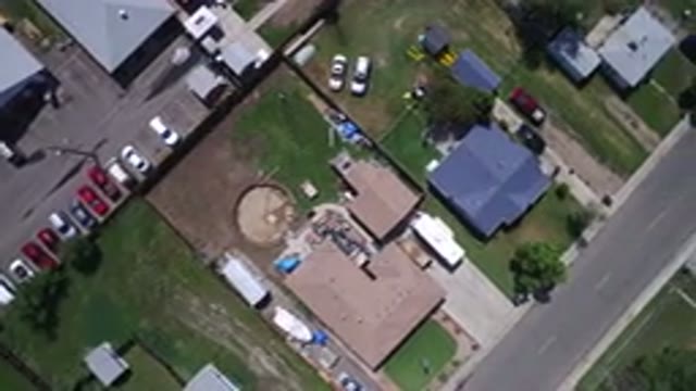 WESTMINSTER COLORADO-2017: Open View Of An Empty Road Showing Rooftop Houses And Parked Cars
