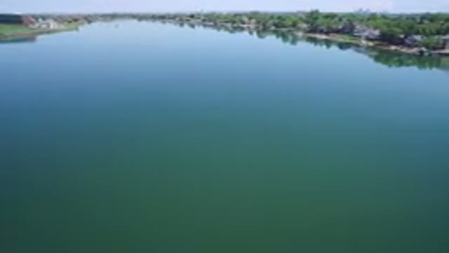 WESTMINSTER COLORADO-2017: Panoramic View Over A Wide River On A Summer's Day