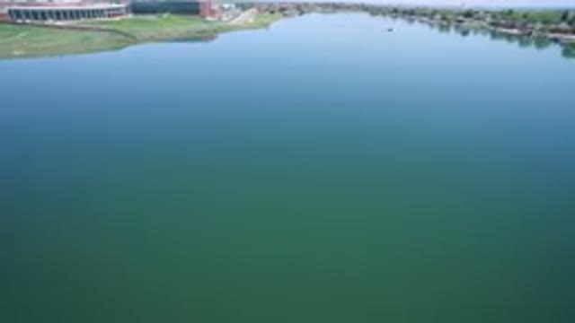 WESTMINSTER COLORADO-2017: Lake With Calm And Greenish Waters And Boat Sailing