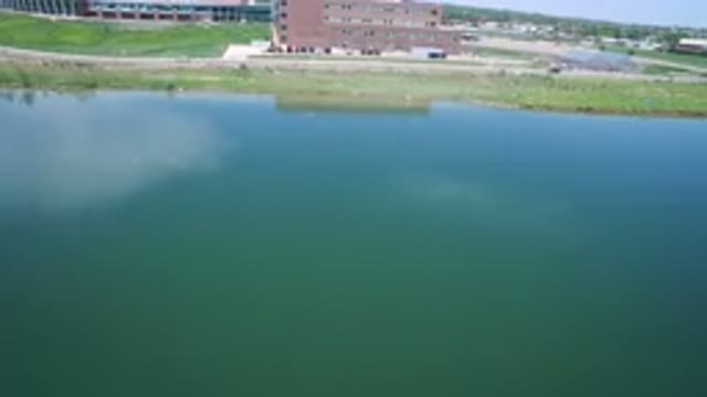 WESTMINSTER COLORADO-2017: A Large Body Of Water Next To A Patch Of Developed Land