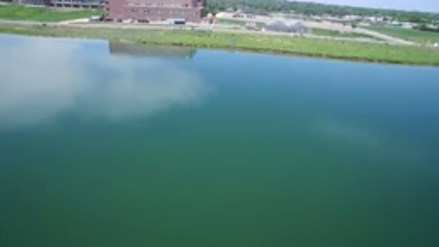 WESTMINSTER COLORADO-2017: Aerial View Of A Road Along A Calm Body Of Water
