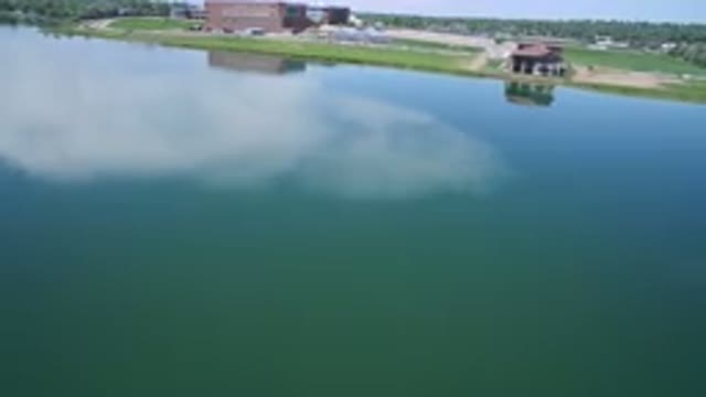 WESTMINSTER COLORADO-2017: Clear Blue Lake Reflecting A Clear Blue Sky With