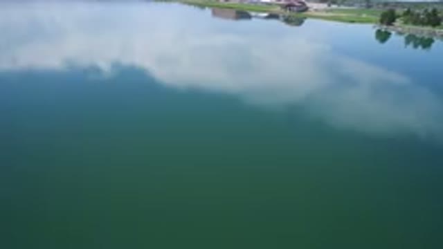 WESTMINSTER COLORADO-2017: House On The Shore Of A Large Lake In A Well-Wooded
