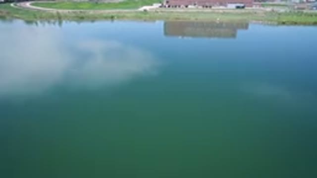 WESTMINSTER COLORADO-2017: Drone Flying Over A Lake With A Nice View Of A Shore