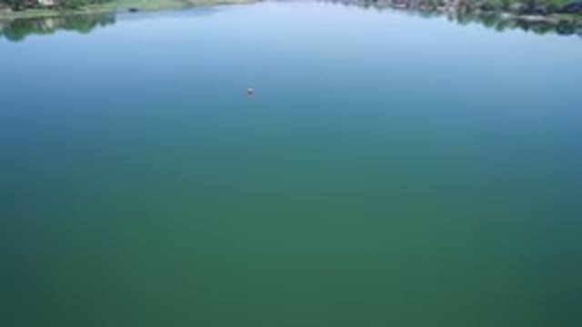 WESTMINSTER COLORADO-2017: A White Sailboat Sailing in the Clear Waters of the Lake